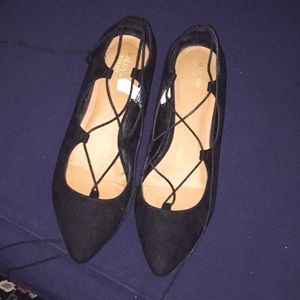 Lace up black faux suede flats